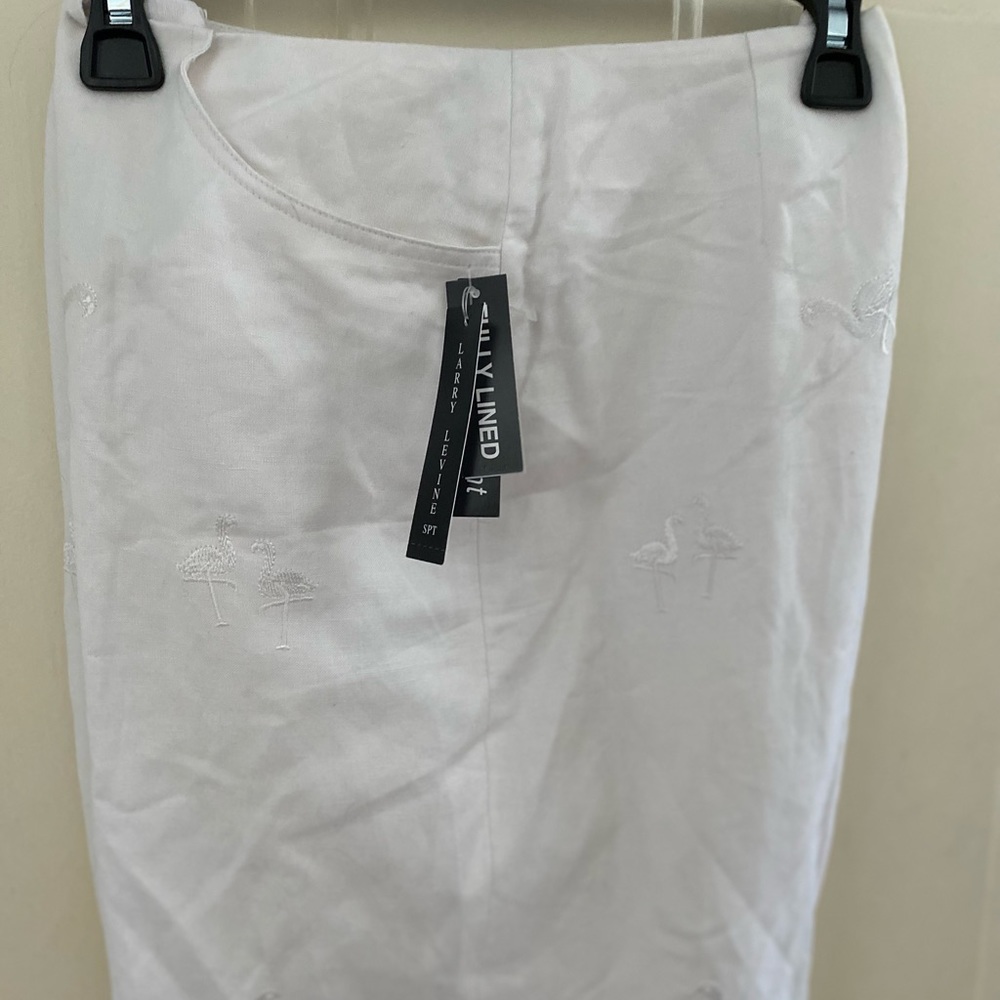 White flamingo cropped pants. Fully lined and New with tags. Size 12.